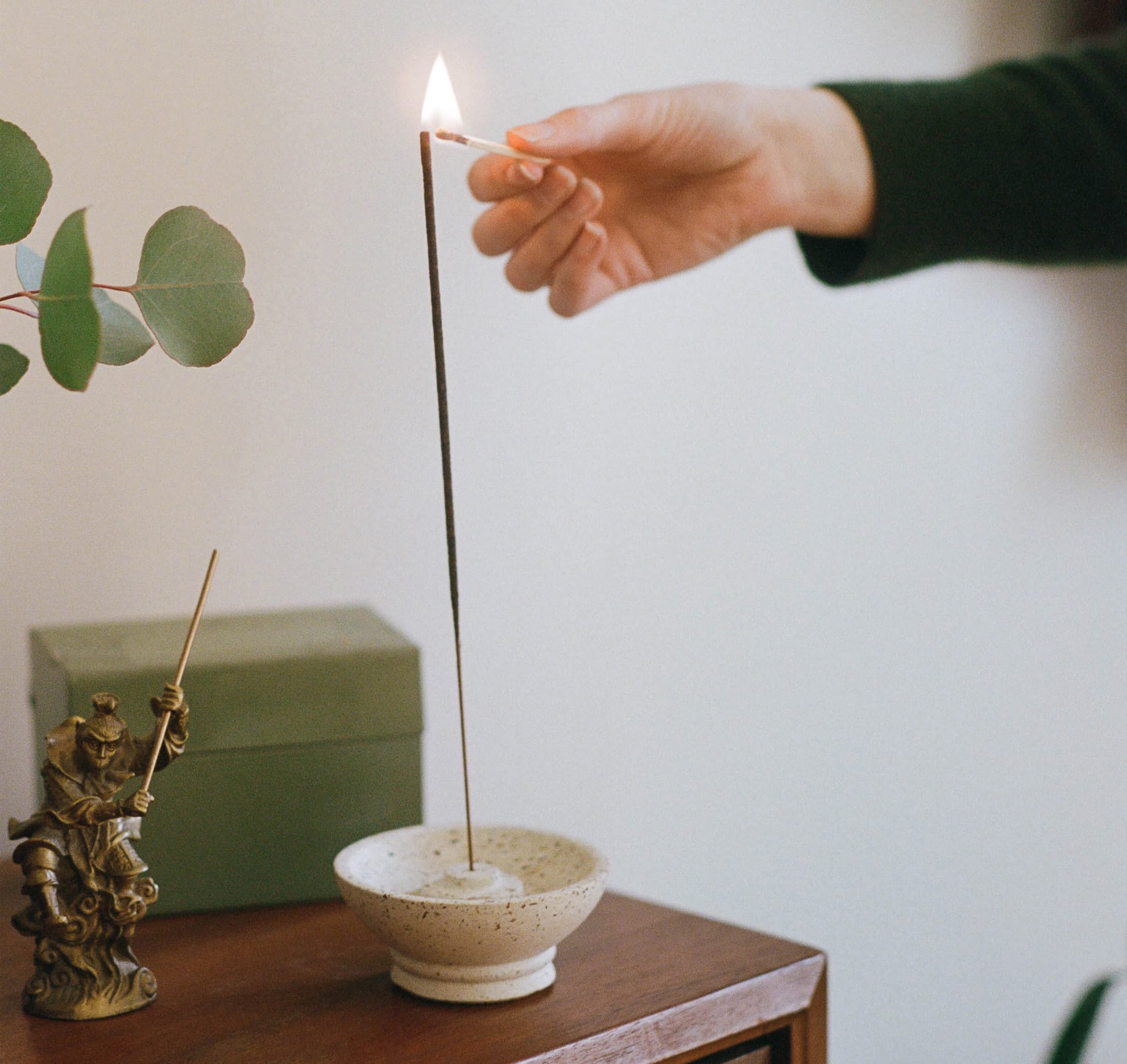 Female lighting incense